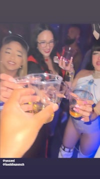 a group of people drinking at a party