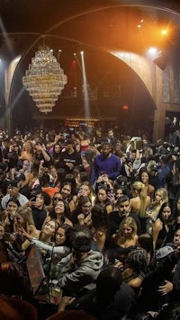 a crowd of people at a nightclub