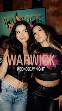 two women standing next to each other with the words wapwick wednesday night